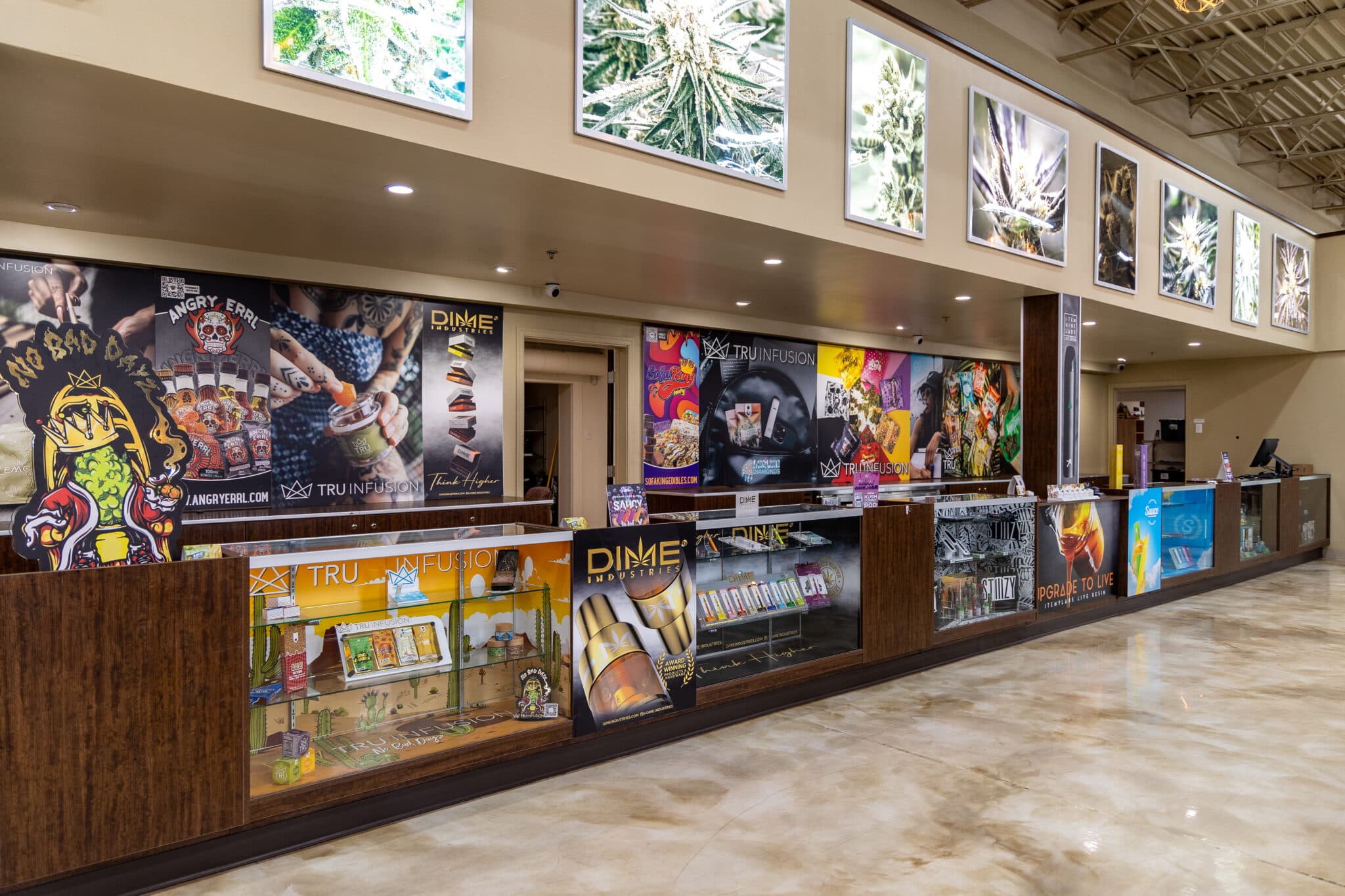 Nature’s Wonder Dispensary Interior Showcase Interior of Nature’s Wonder Dispensary with cannabis products, artwork, and a clean counter area.